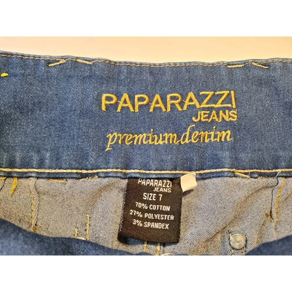 Paparazzi denim Jeans a triple-button high waist and distinctive red Trim